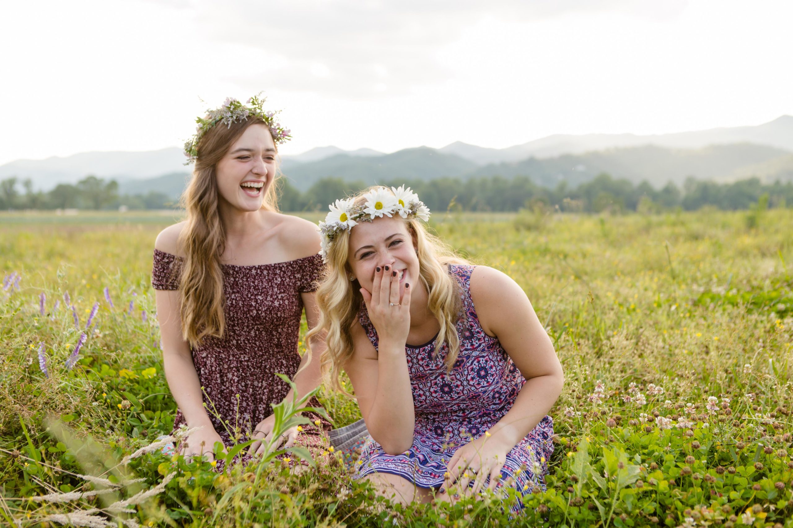 Best Friend Senior Session Kilby and Neva laughing sitting in a field of flowers Photo