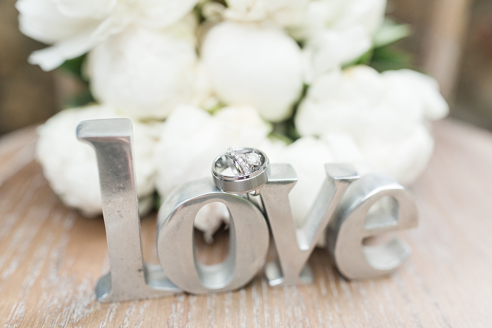 Hawkesdene Wedding Wedding Rings and the Word Love Photo