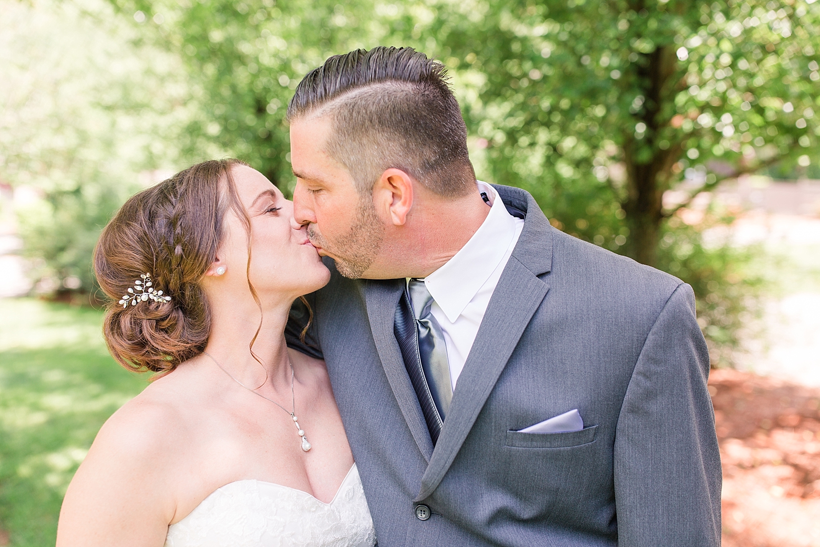 Hawkesdene Wedding Bride and Groom Kissing Photo