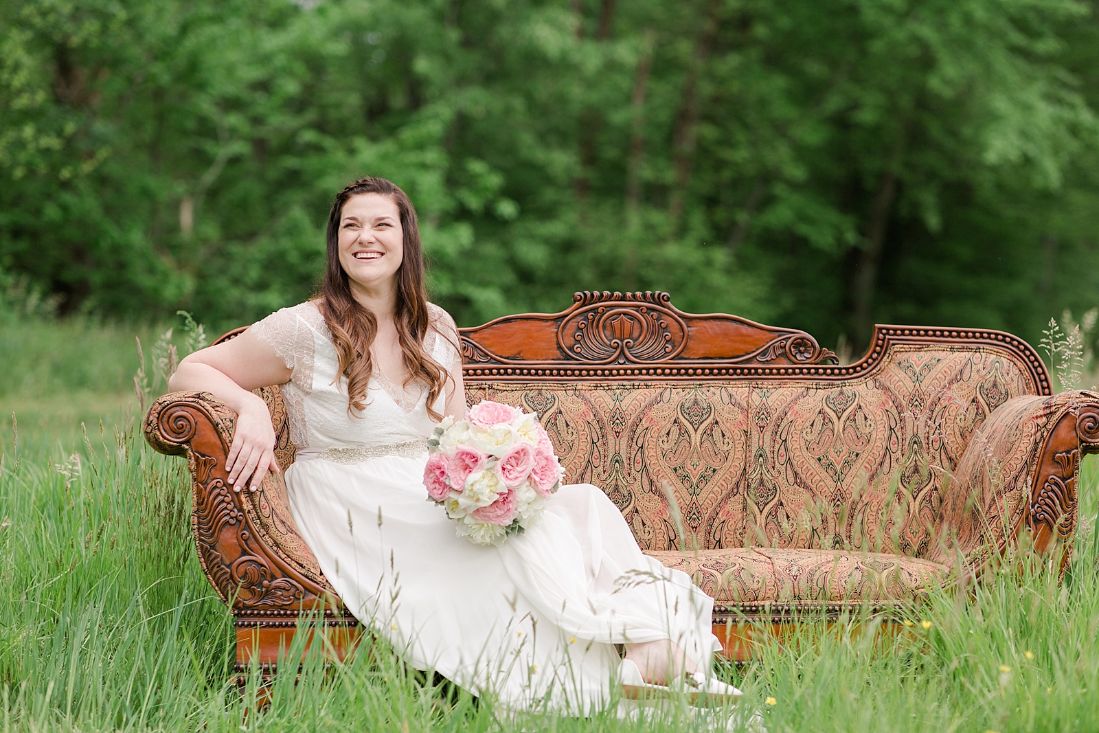 McGuire's Millrace Farm Wedding Bride Smiling on Couch Photo