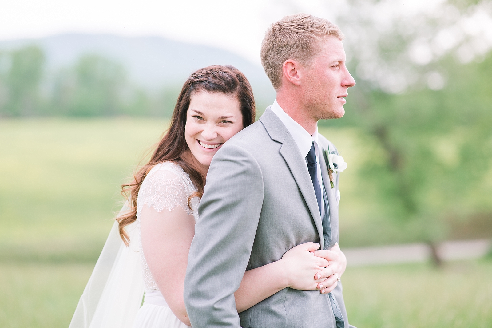 McGuire's Millrace Farm Wedding Bride Smiling and Hugging Groom Photo