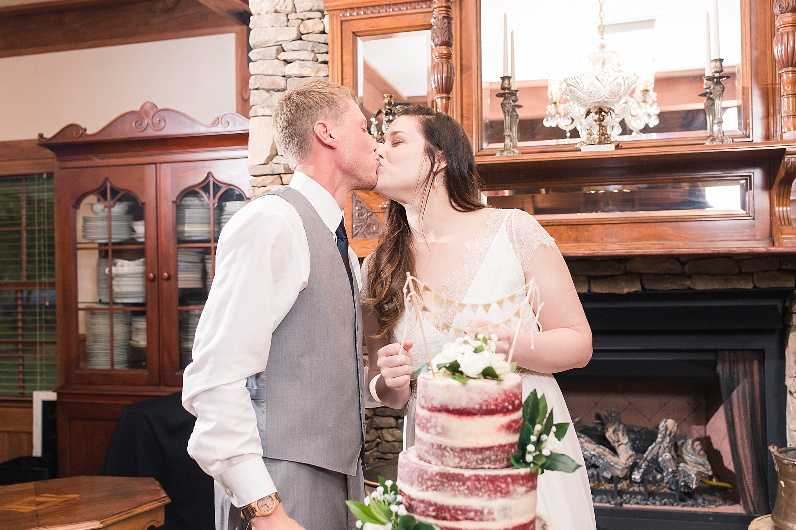 McGuire's Millrace Farm Wedding Bride and Groom Kissing at Cake Photo