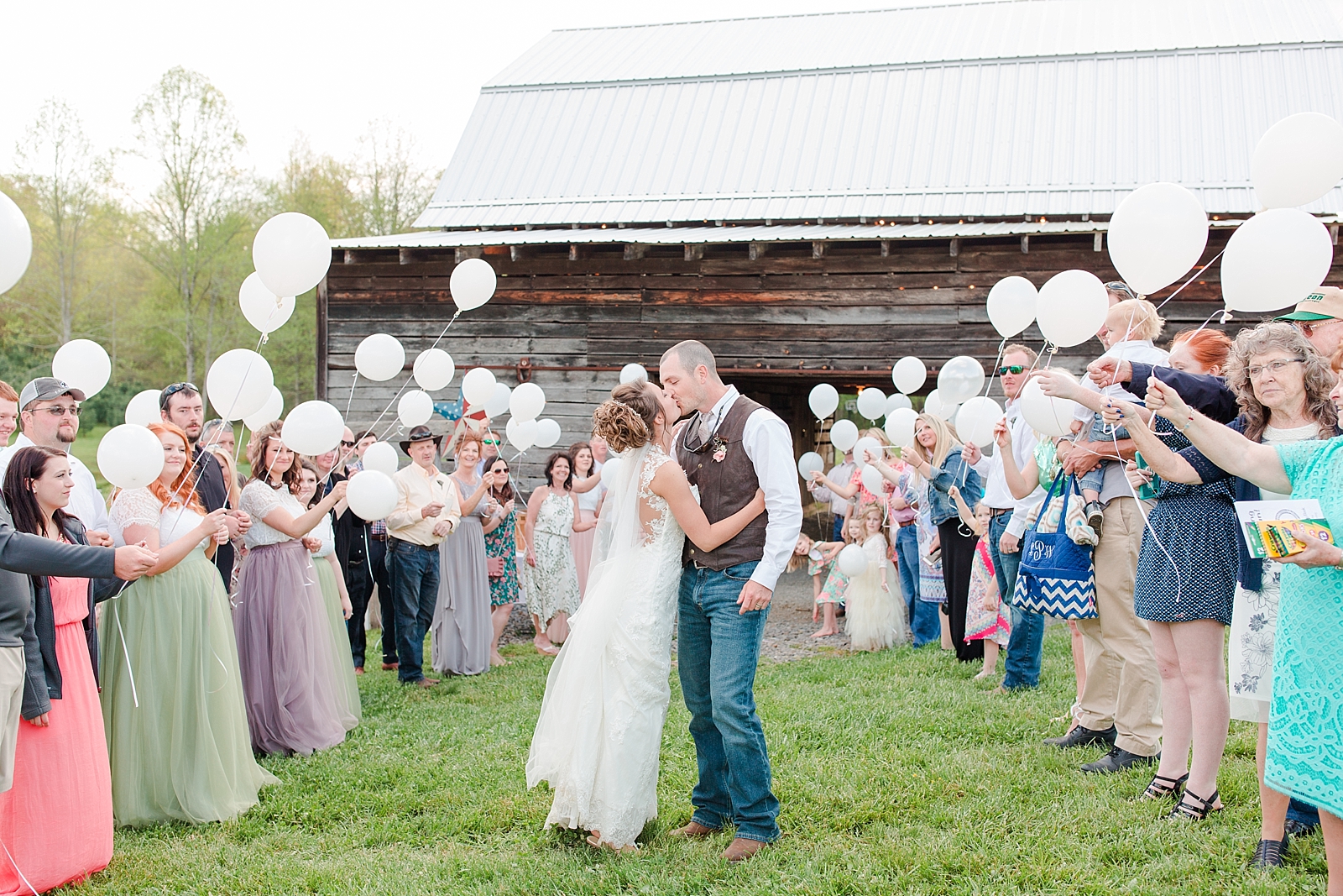 Payne Meadows Wedding Bride and Groom Exit with Balloons Photo