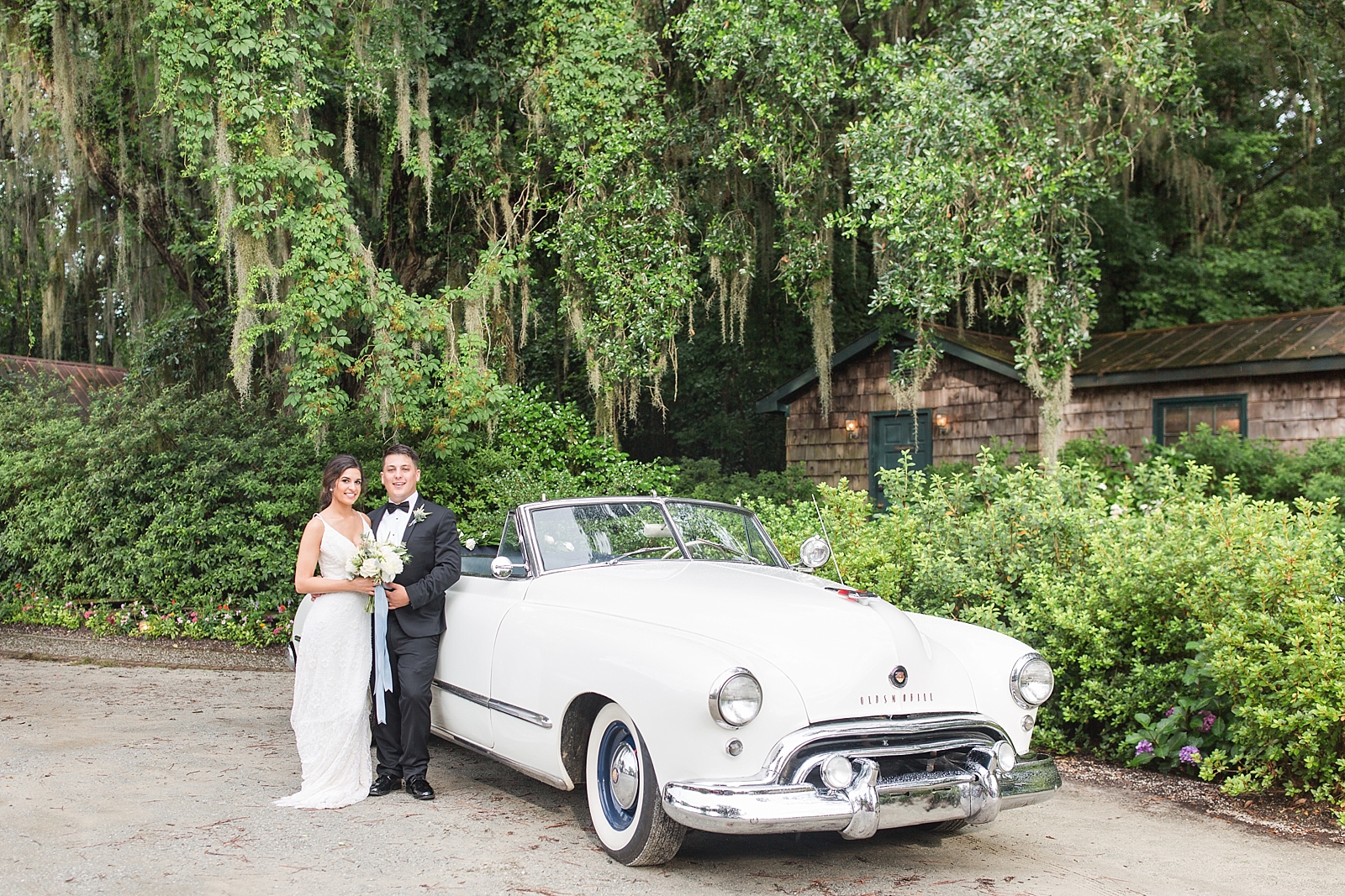Magnolia Plantation Wedding Bride and Groom with Vintage Oldsmobile Photo