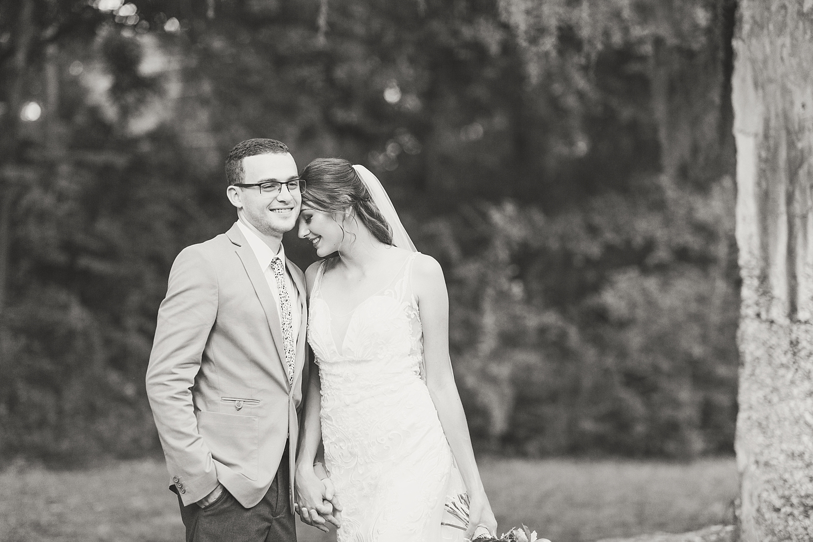 Beaufort South Carolina Wedding black and white of bride and groom snuggling and laughing Photo