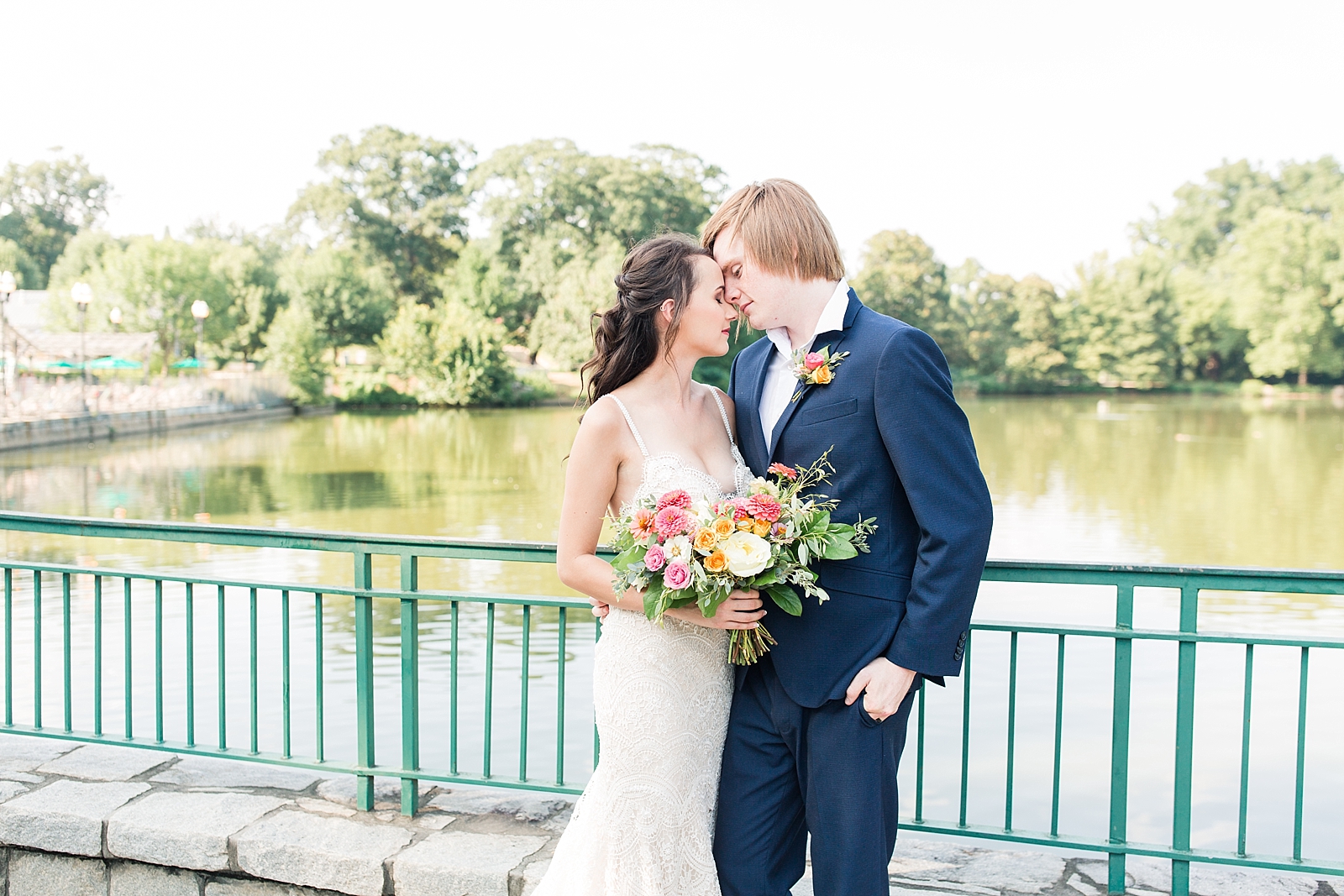 Atlanta Georgia Elopement Bride and Groom nose to nose in front of pond Photo