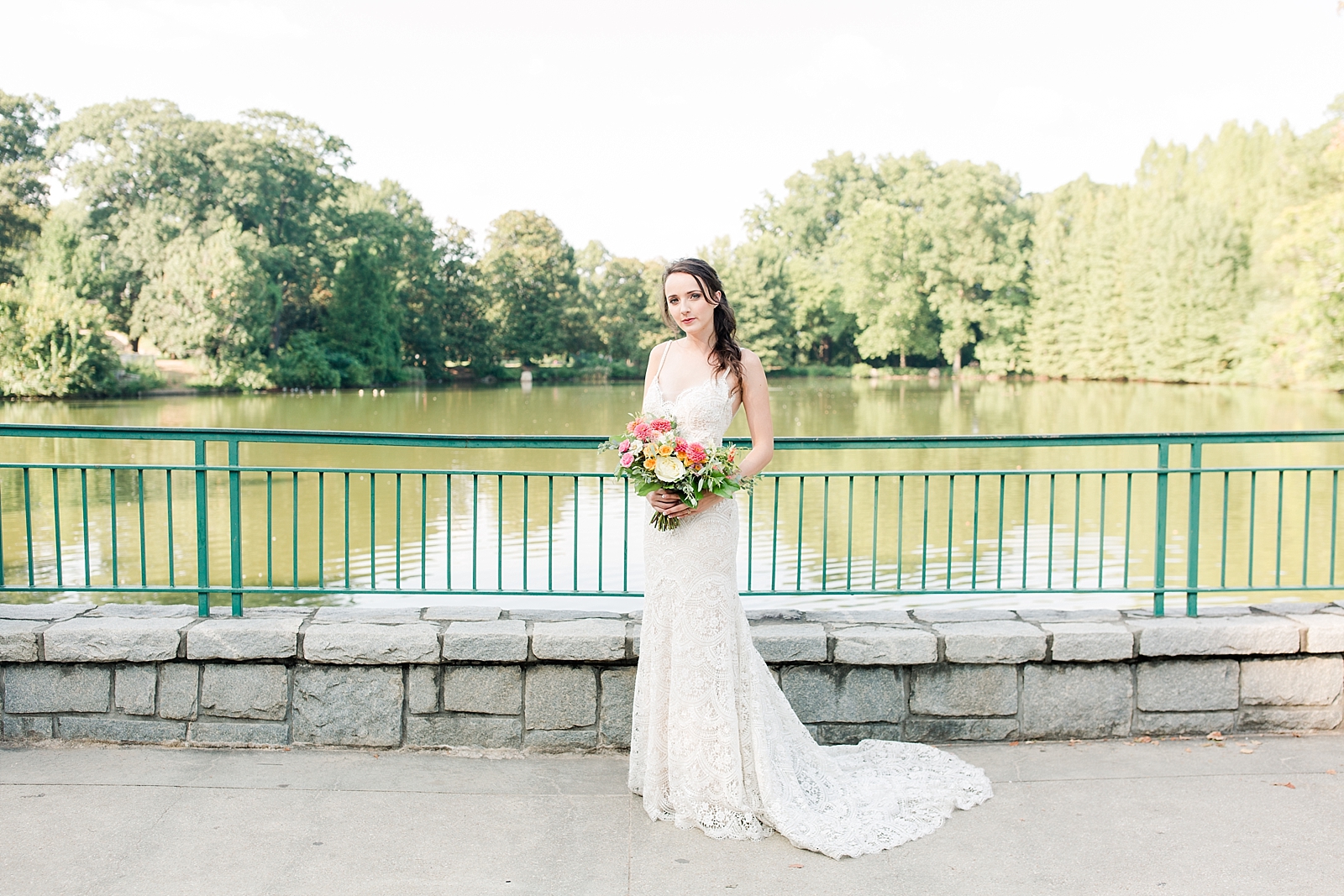 Atlanta Georgia Elopement Bride on bridge in front of pond Photo