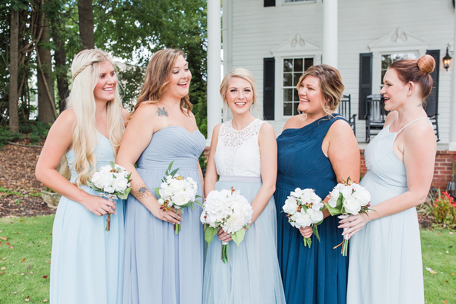 Dahlonega Wedding Venue Bride with Bridesmaids smiling and Laughing Photo