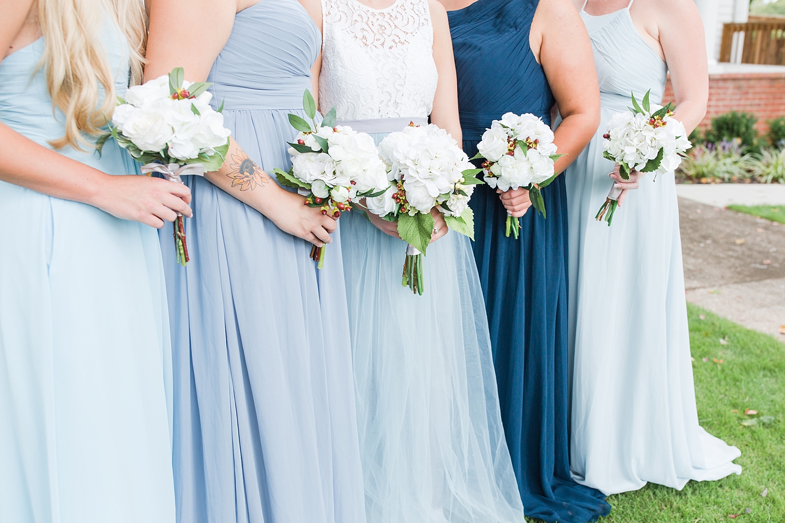 Dahlonega Wedding Venue Bridal Party Detail of Blue Dresses and Bouquets Photo