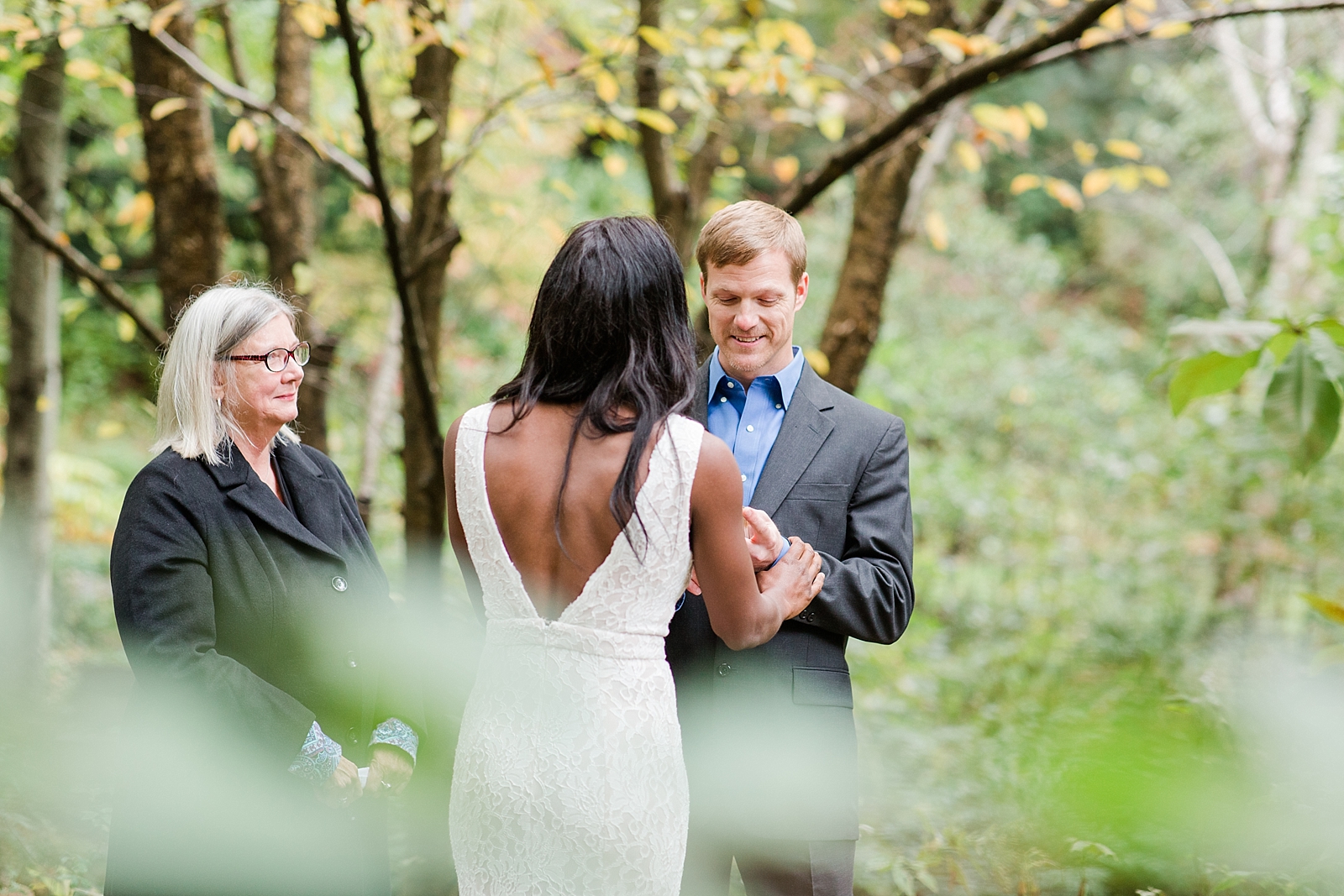 Asheville Botanical Gardens Elopement Bride and Groom sharing vows Photo