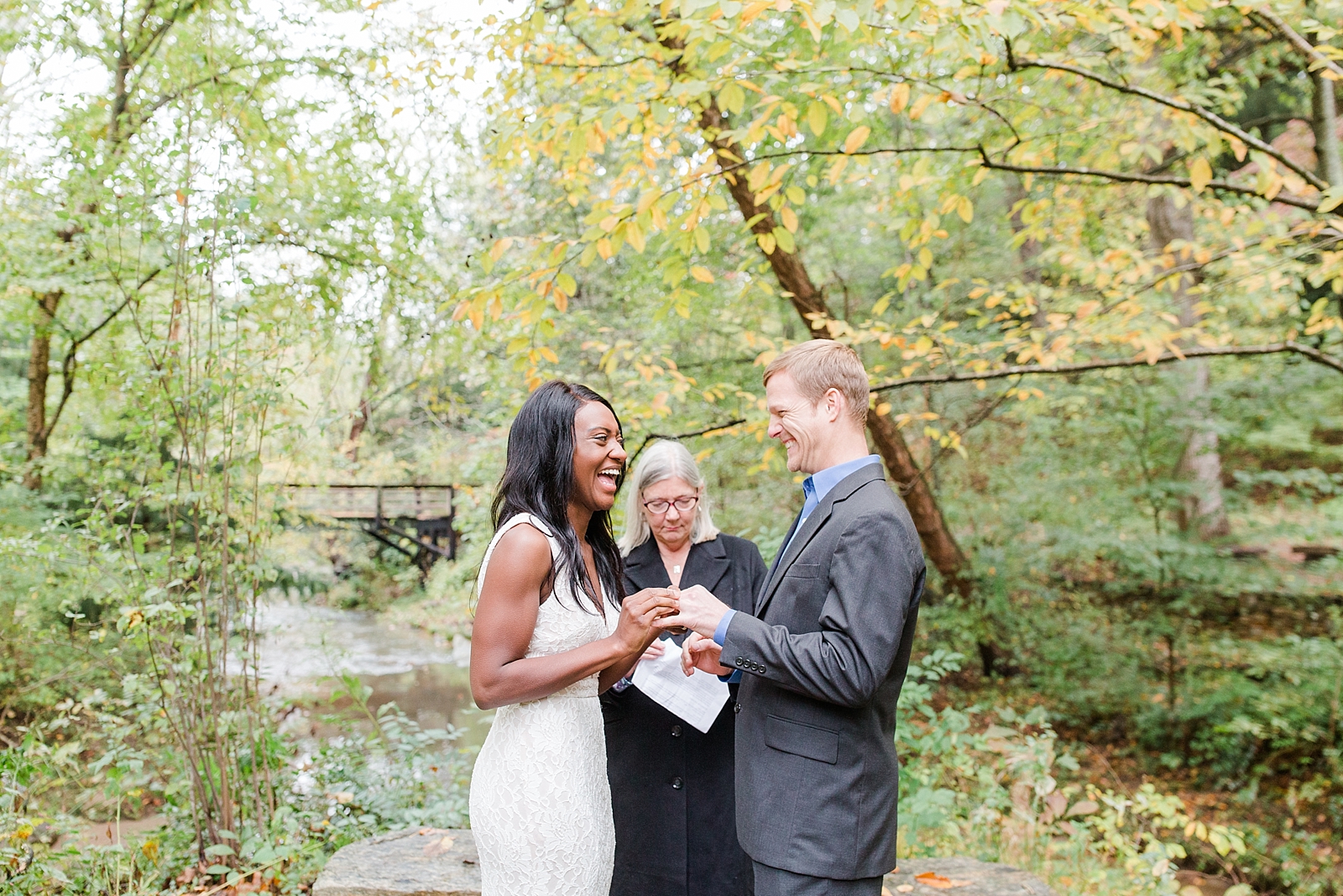 Asheville Botanical Gardens Elopement Couple laughing and exchanging rings Photo