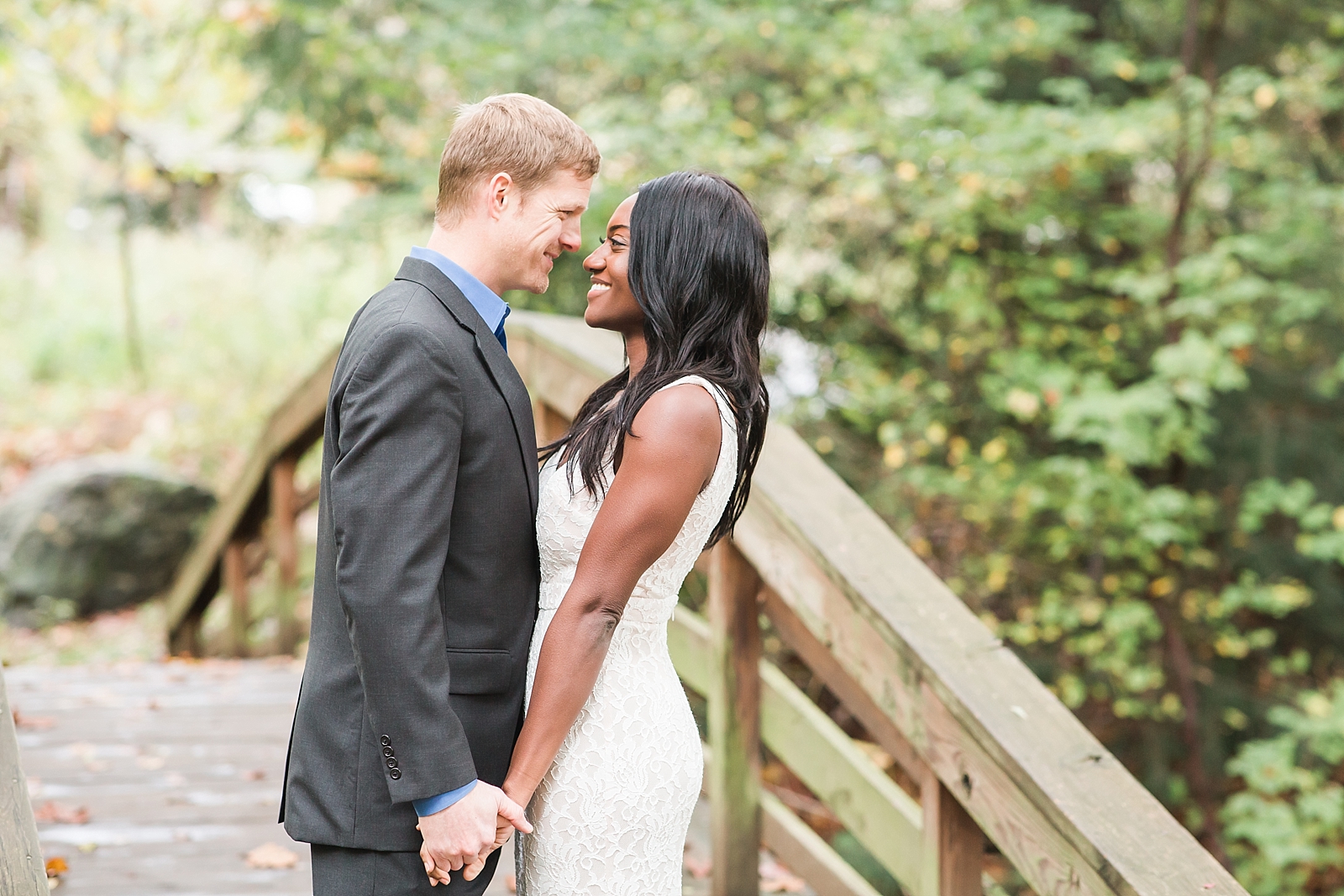 Asheville Botanical Gardens Elopement Bride and Groom smiling at each other Photo
