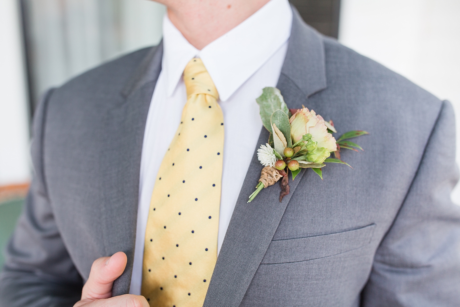 Columbia SC wedding venue detail of grooms boutonnière and tie photo
