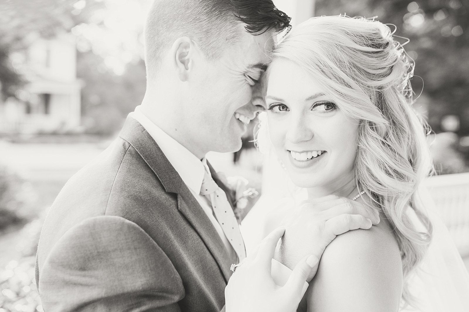 Columbia SC wedding venue black and white of bride and groom laughing together photo