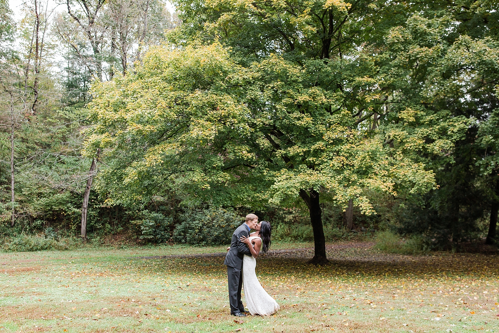 Asheville Botanical Gardens Elopement Couple kissing in field Photo