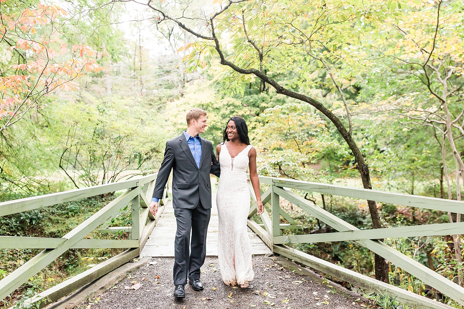 Asheville Botanical Gardens Elopement Bride and Groom smiling at each other Photo