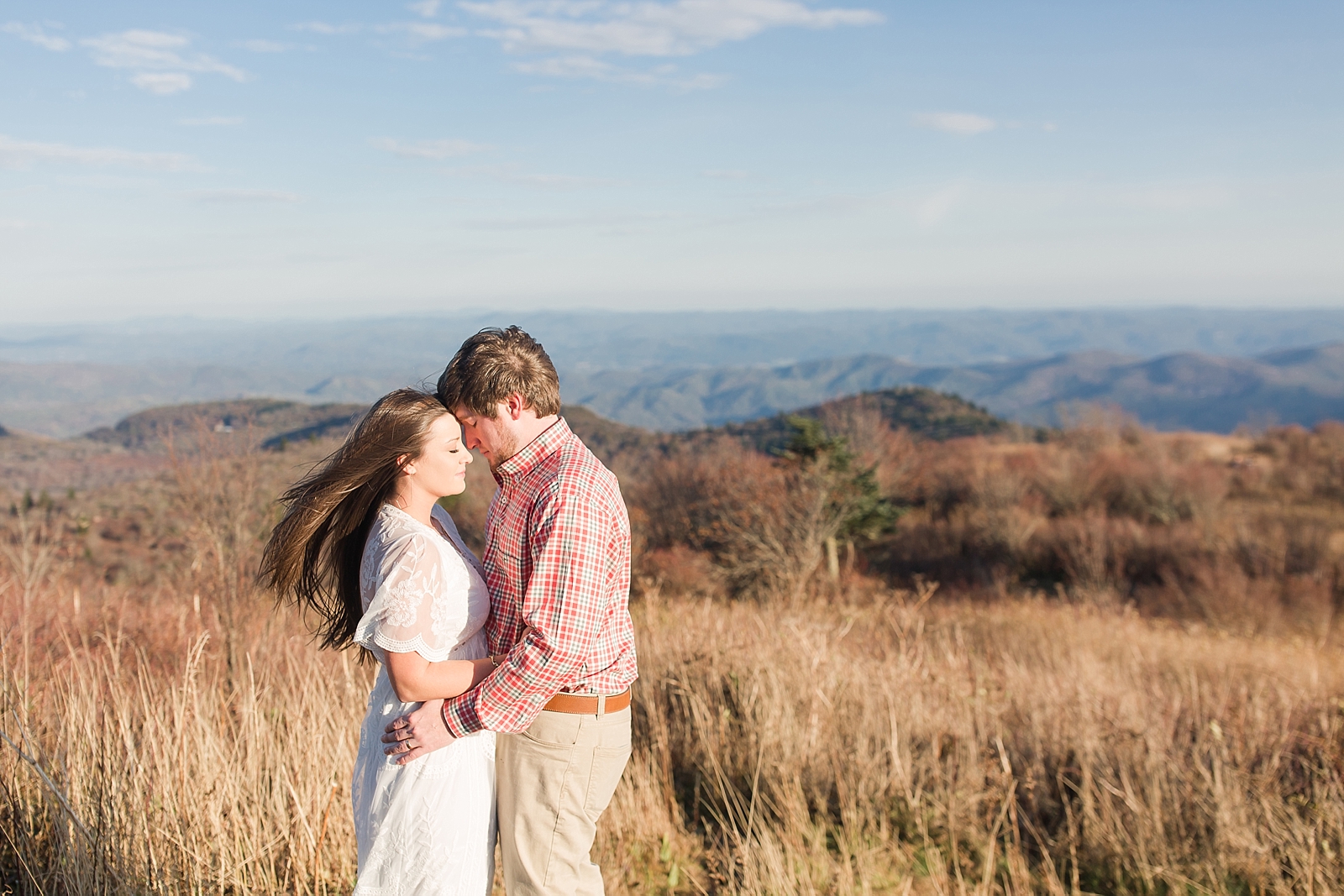 Black Balsam Knob Anniversary couple nose to nose with mountain backdrop Photo