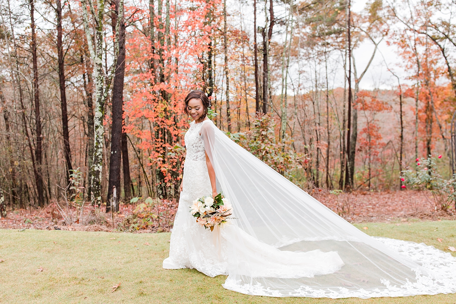 Juliette Chapel Wedding Bride walking on lawn with fall colors Photo