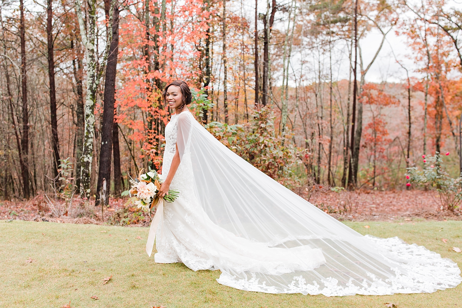 Juliette Chapel Wedding Bride walking on lawn with orange trees in the background Photo