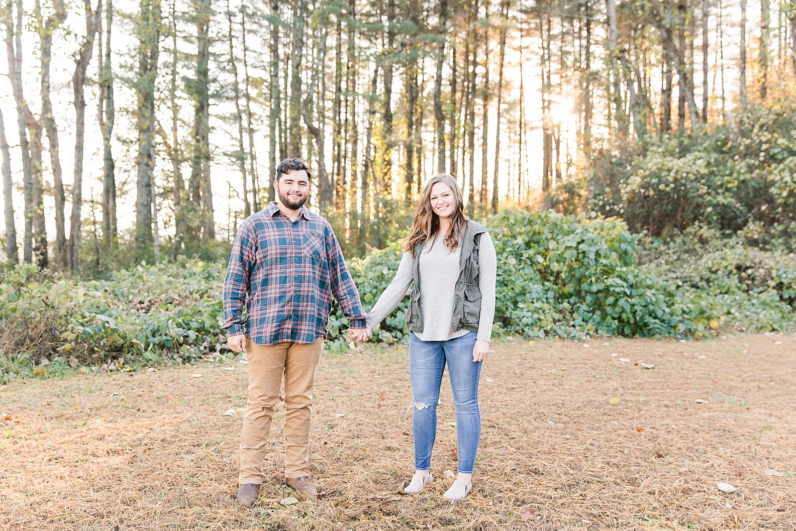 North Carolina Mountains Engagement Cassie and Evan holding hands Photo