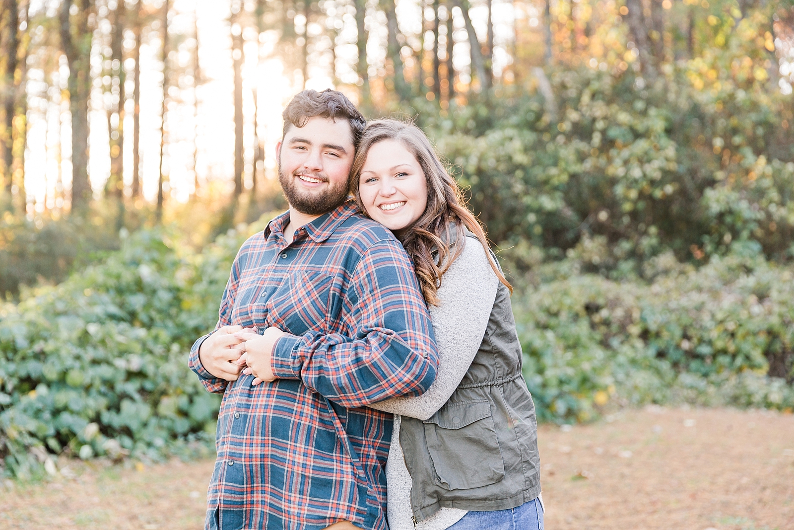 North Carolina Mountains Engagement Couple Hugging and smiling at the camera Photo