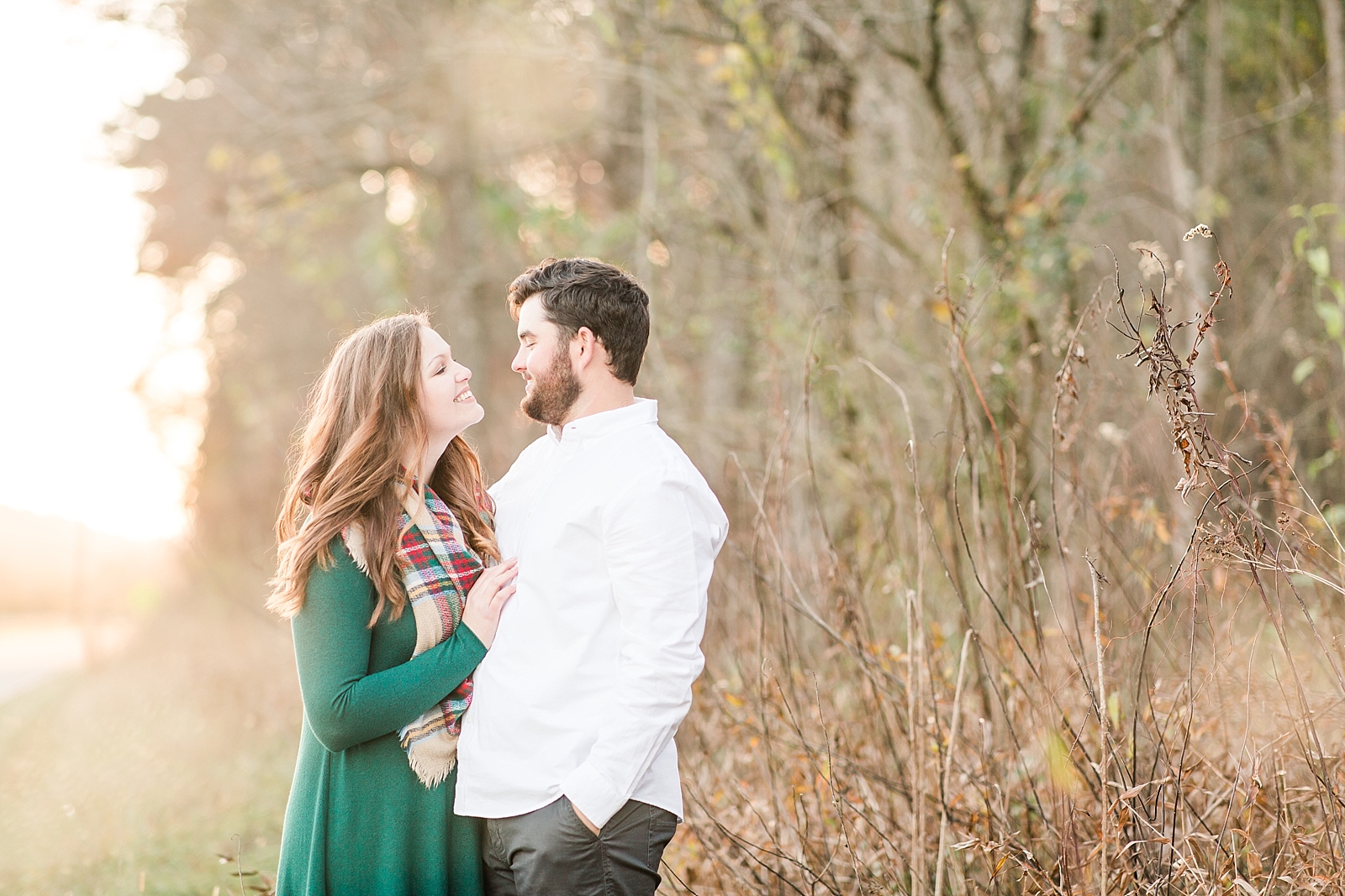 North Carolina Mountains Engagement Couple smiling at each other Photo