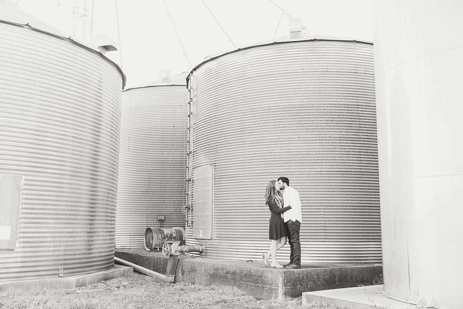 North Carolina Mountains Engagement Black and White of Cassie and Evan in front of Silos Photo