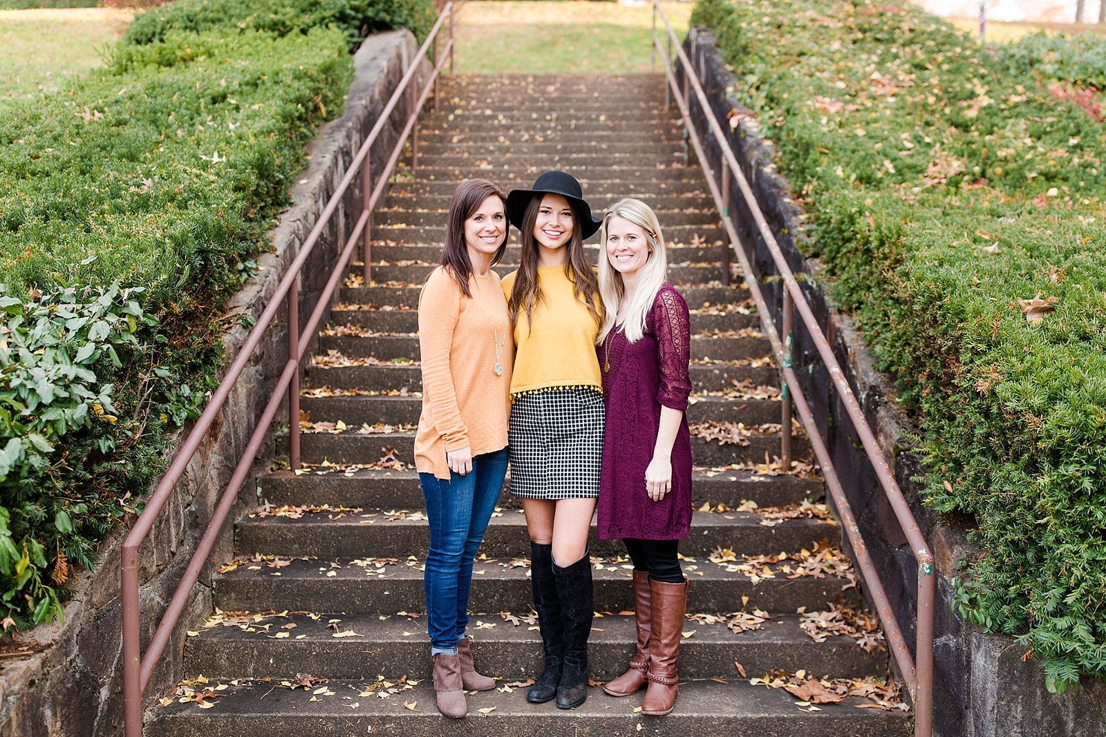 Western Carolina University Senior Sierra with her mom and aunt on stairs photo