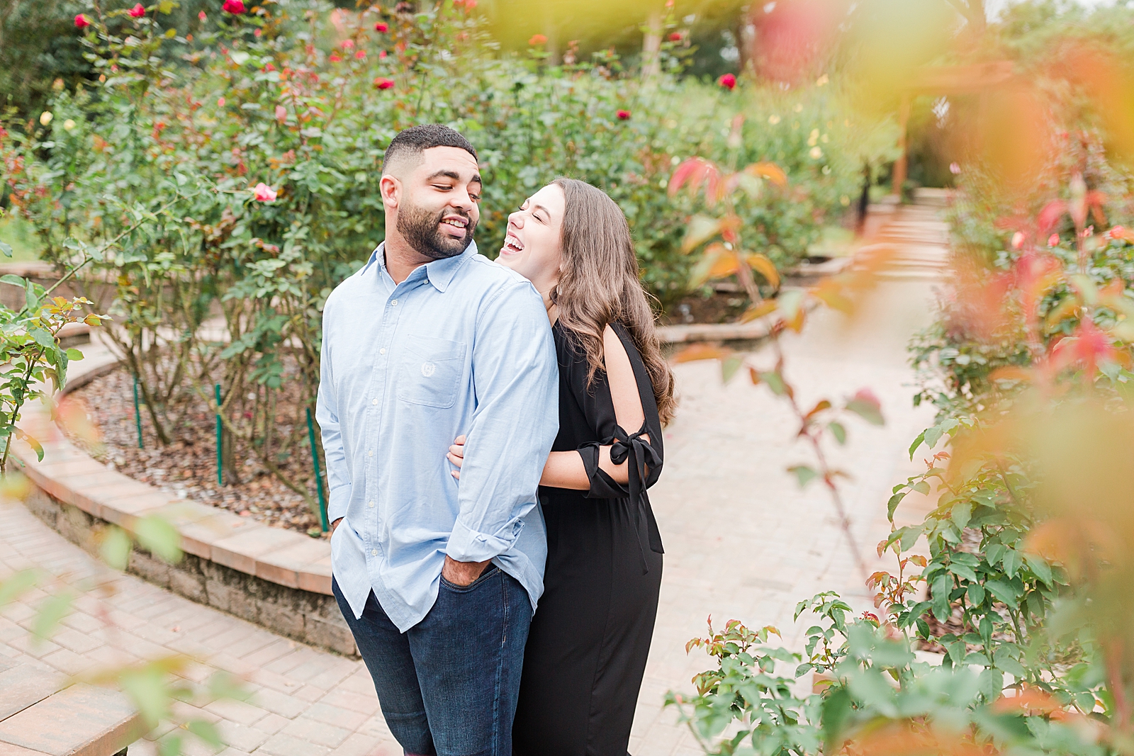 St. Augustine Engagement Couple Laughing at each other Photo