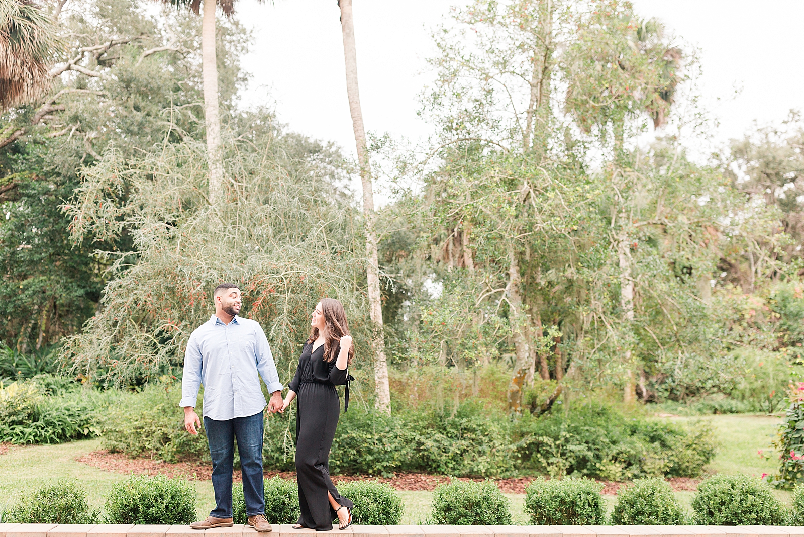 St. Augustine Engagement Couple walking holding hands Photo