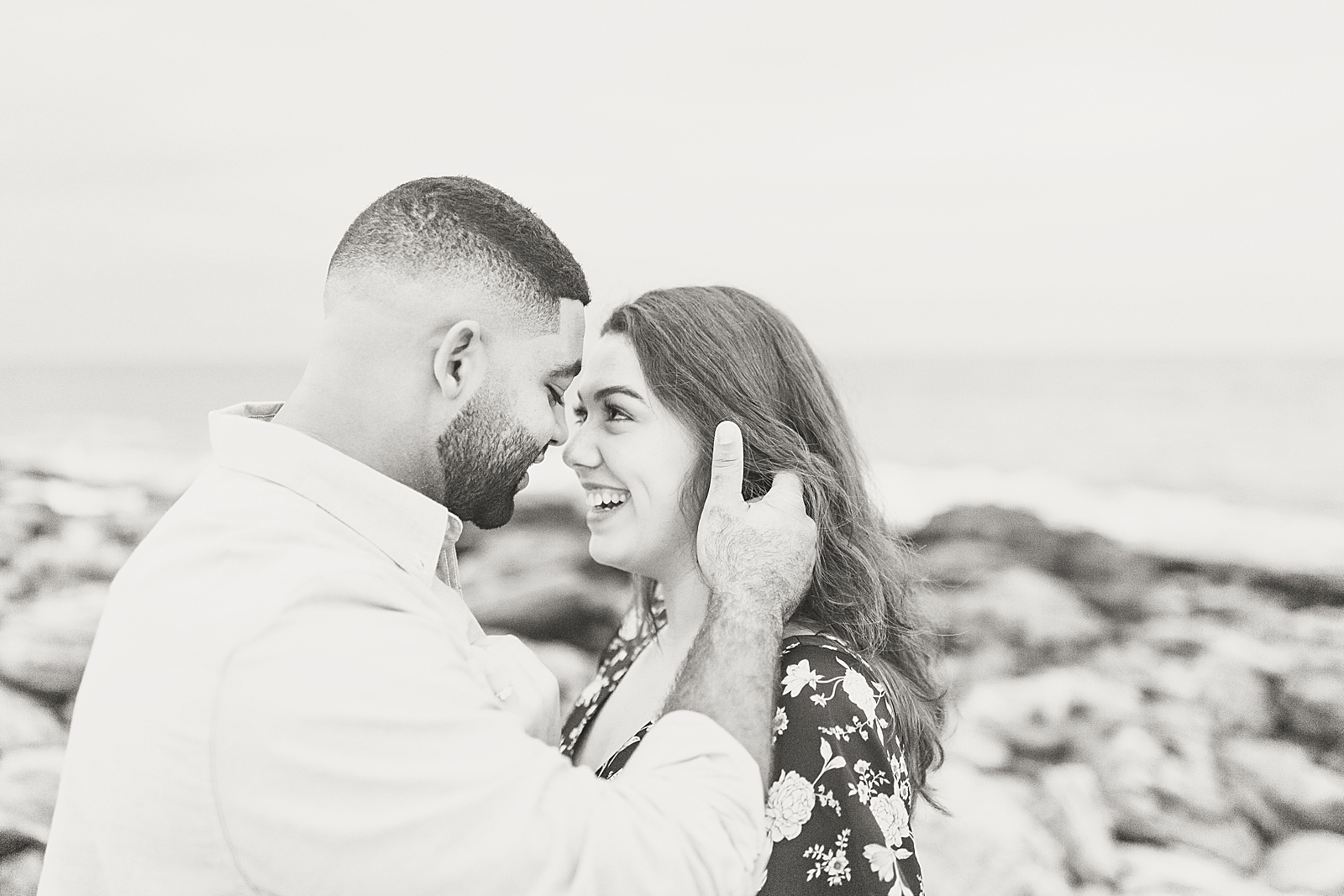 St. Augustine Engagement Black and white of couple smiling at each other Photo