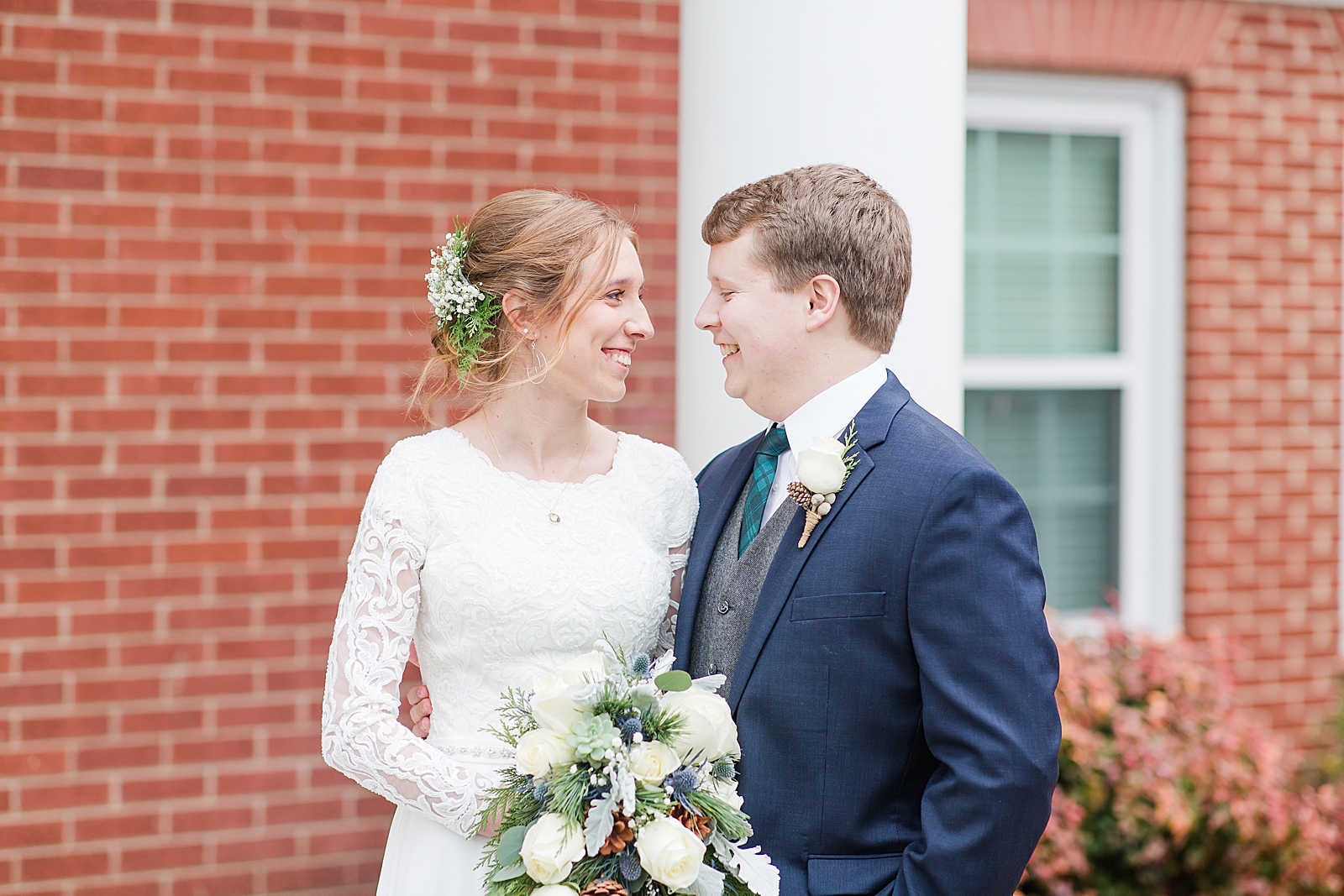 Charlotte Wedding Bride and Groom Smiling at each other in front of the Church Photo