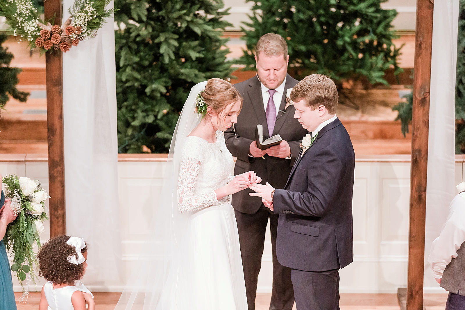 Charlotte Wedding Ceremony Bride and Groom exchanging rings Photo