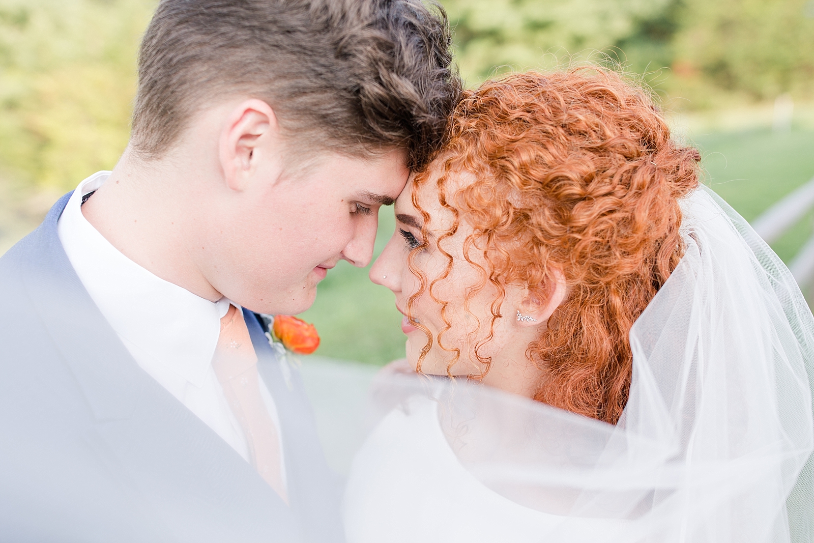 Chestnut Ridge Wedding bride and groom nose to nose with veil sweeping in front Photo
