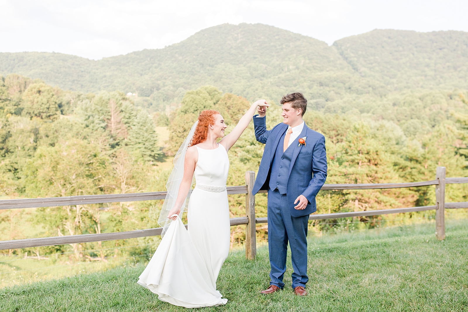 Chestnut Ridge Wedding bride and groom dancing with mountain background Photo