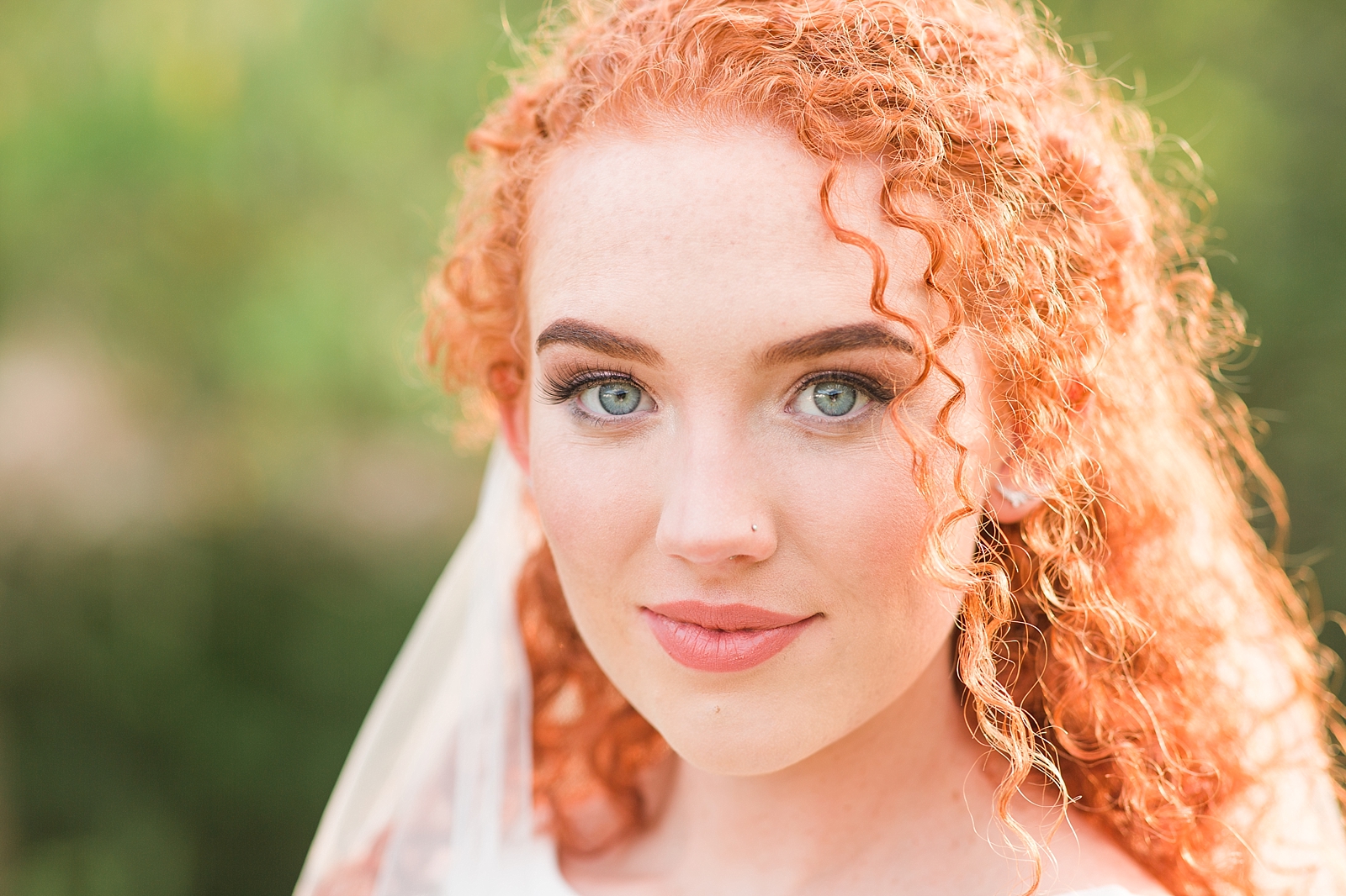 Chestnut Ridge Wedding bride looking into camera with red hair and piercing blue eyes Photo