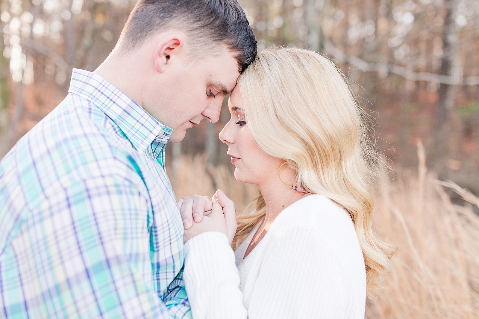 Kennesaw Mountain Engagement Session couple holding hands foreheads together Photo