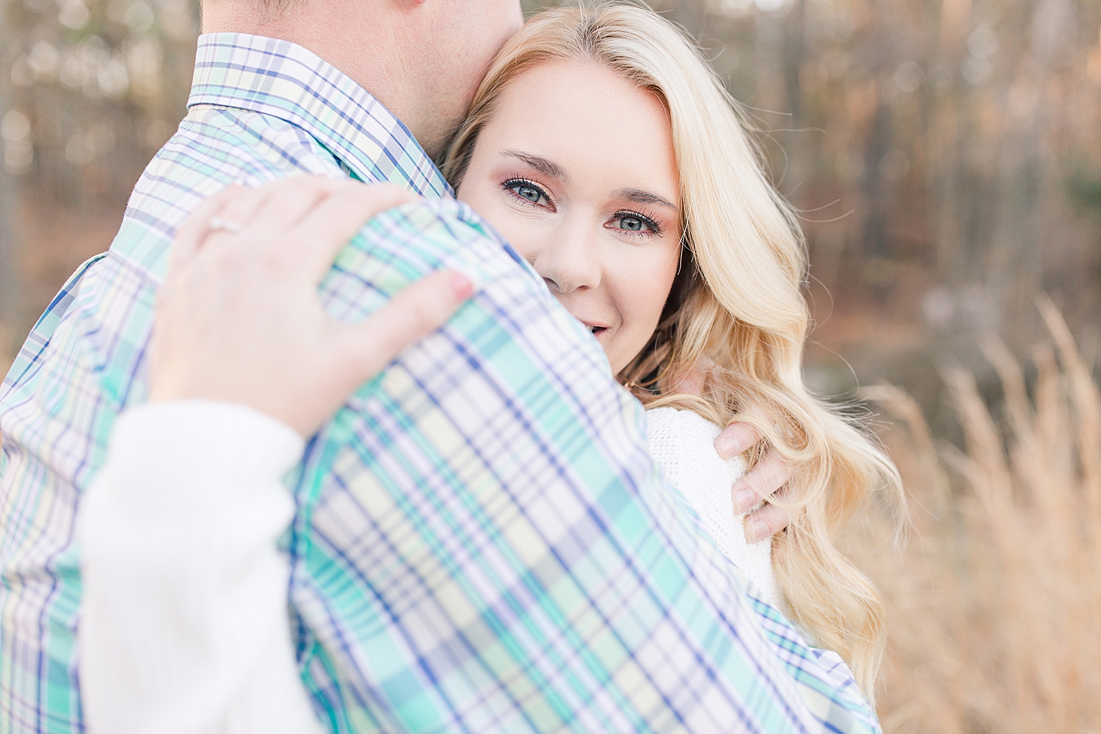 Kennesaw Mountain Engagement Session Sarah smiling over Michael's shoulder Photo