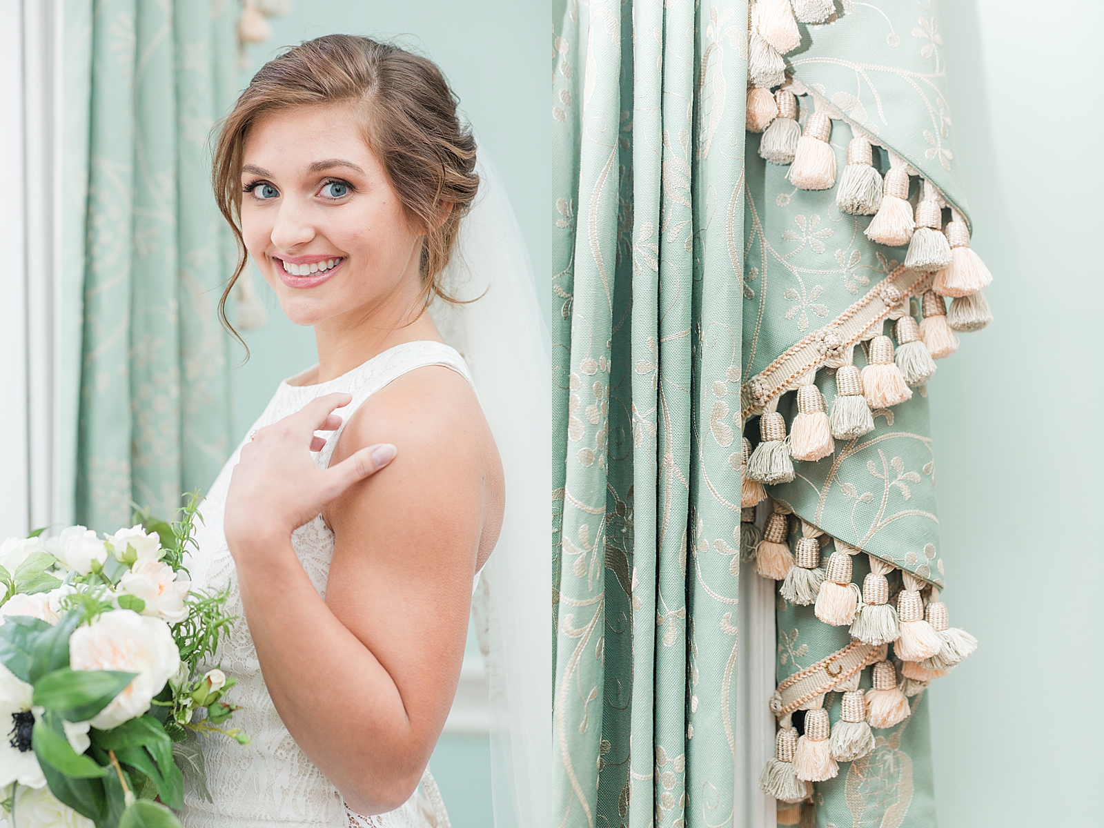 Charleston Bridal Session Bride smiling at camera and detail of drapes photos