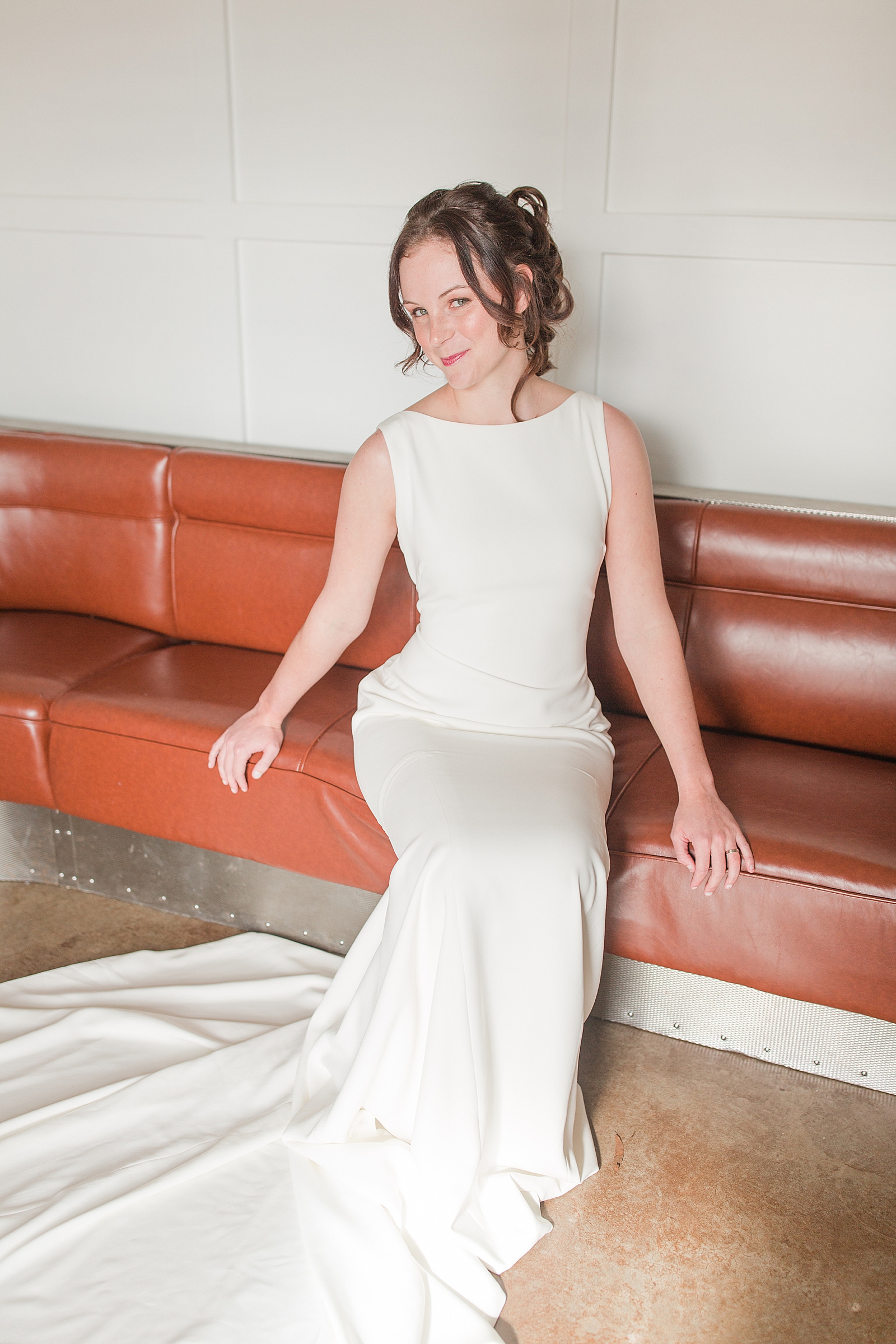 Hackney Warehouse Spring Bridal Session Bride sitting in River Station Bridal Suite Photo