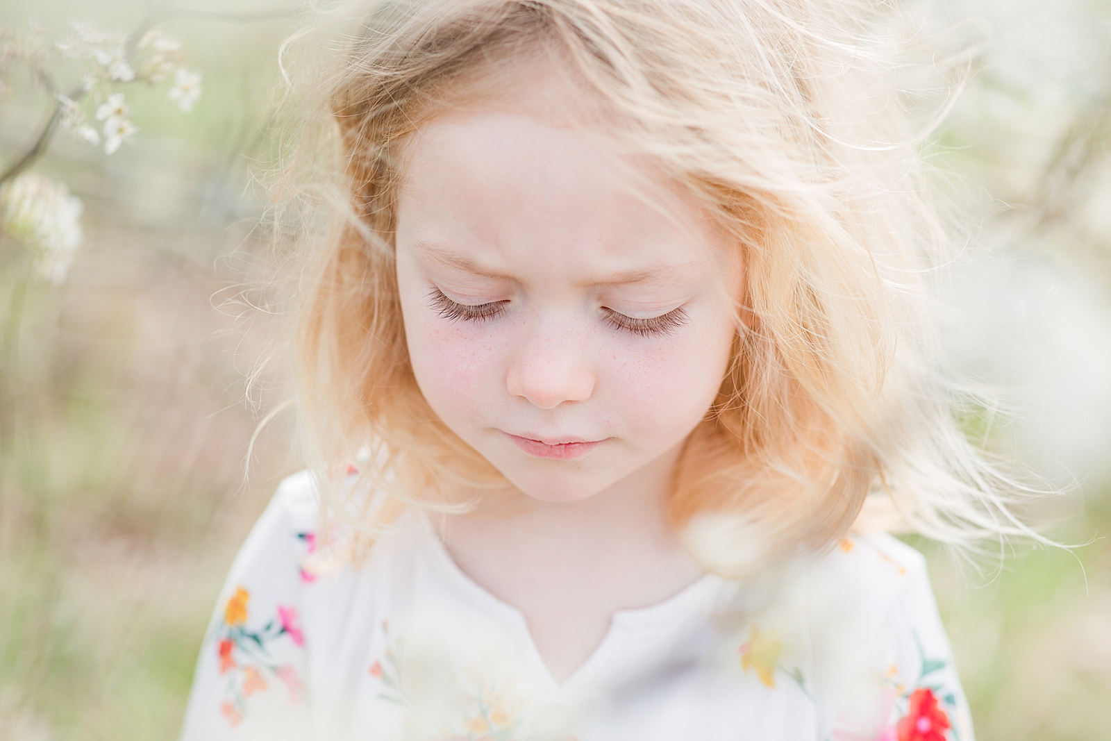 Asheville Photographer's Family little girl hair blowing in the wind Photo