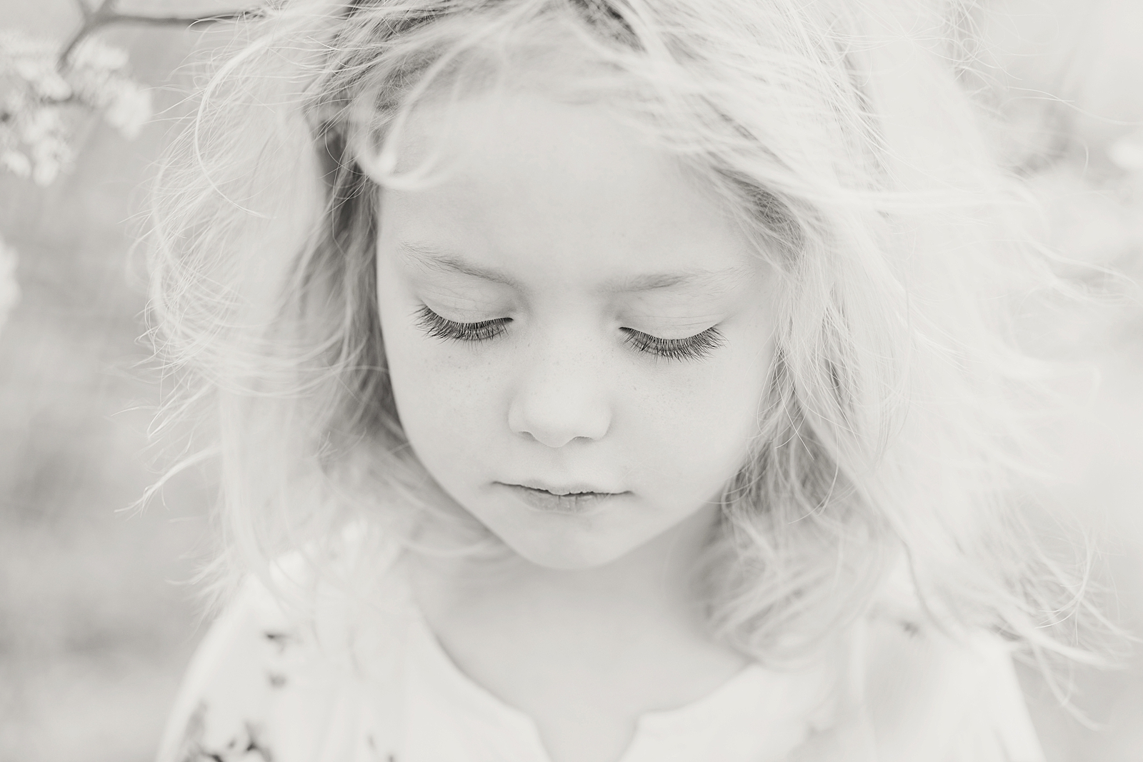 Asheville Photographer's Family Black and White of little girl looking down Photo