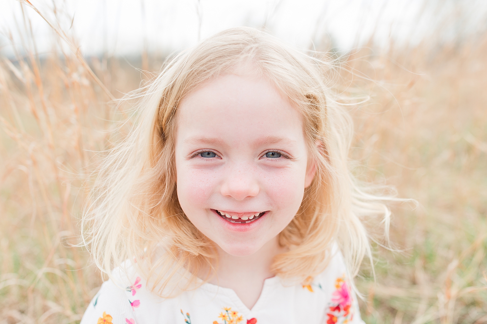 Asheville Photographer's Family blonde little girl with a big smile Photo