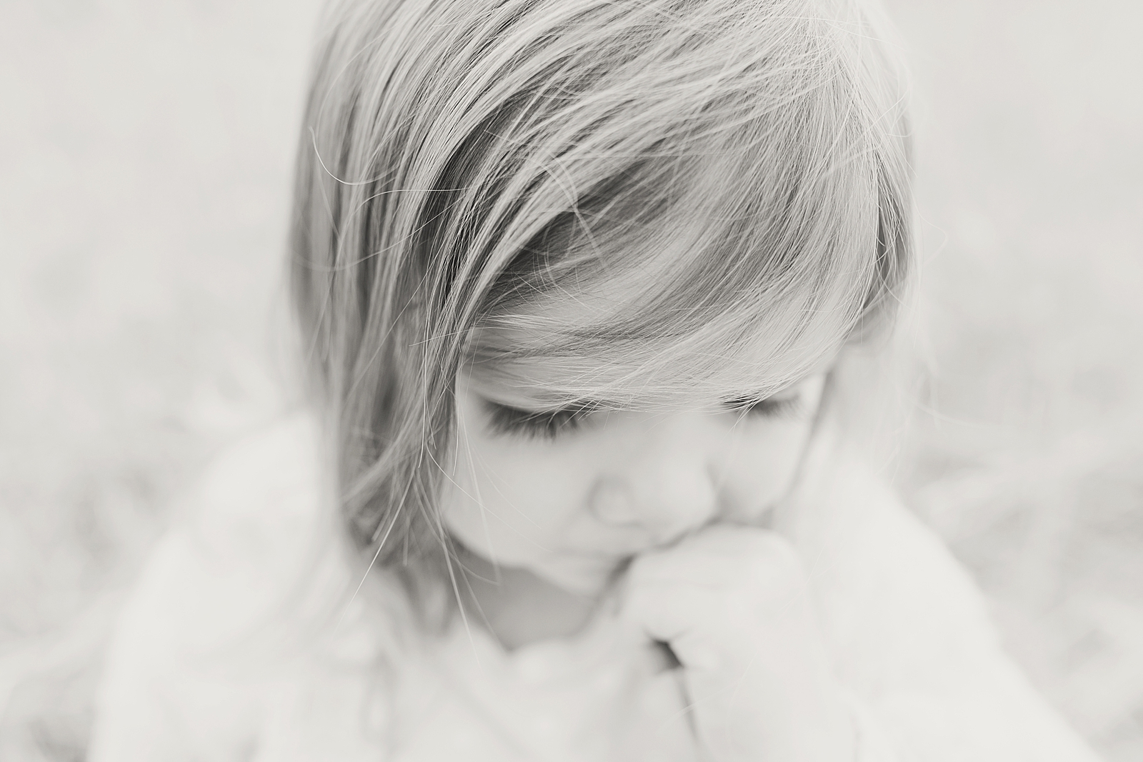 Asheville Photographer's Family Black and White little girl looking down Photo