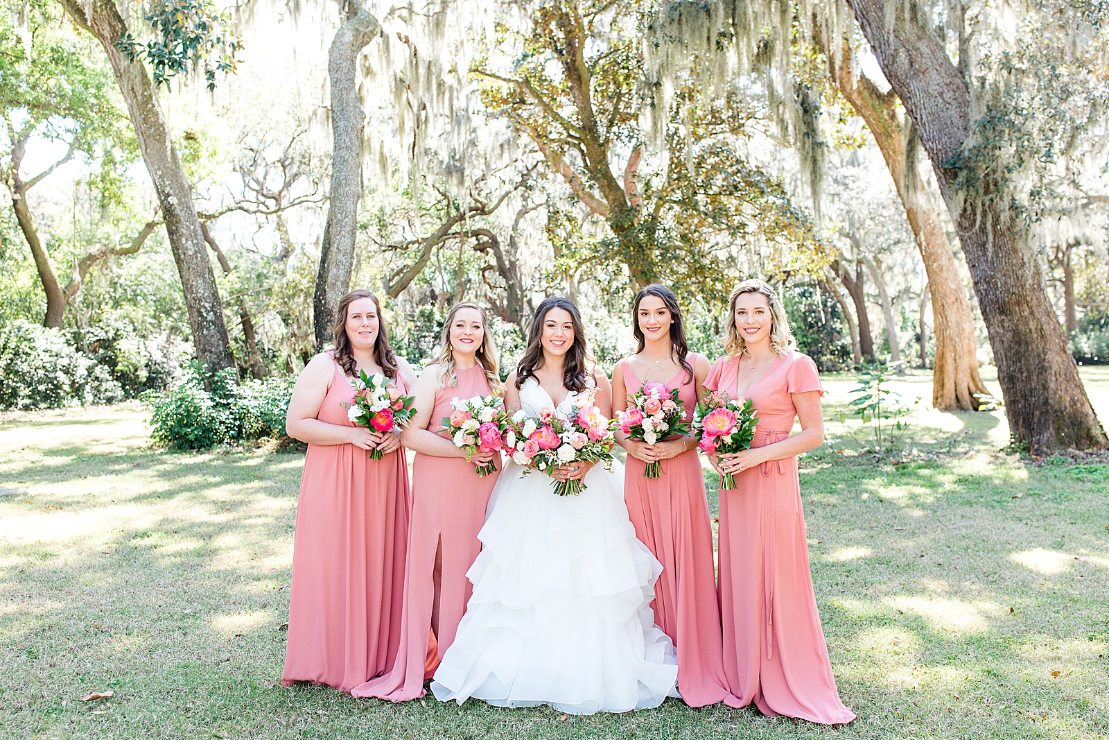 Enchanted Oaks Jacksonville Wedding Bride with Bridesmaids in Coral Dresses Photo