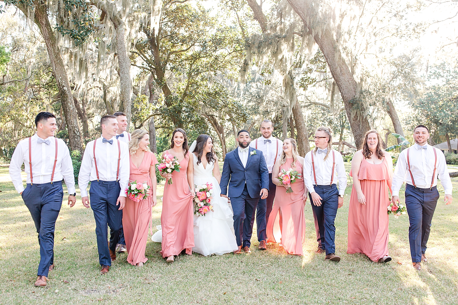Enchanted Oaks Jacksonville Wedding Bride and Groom Walking Toward Camera Smiling Photo