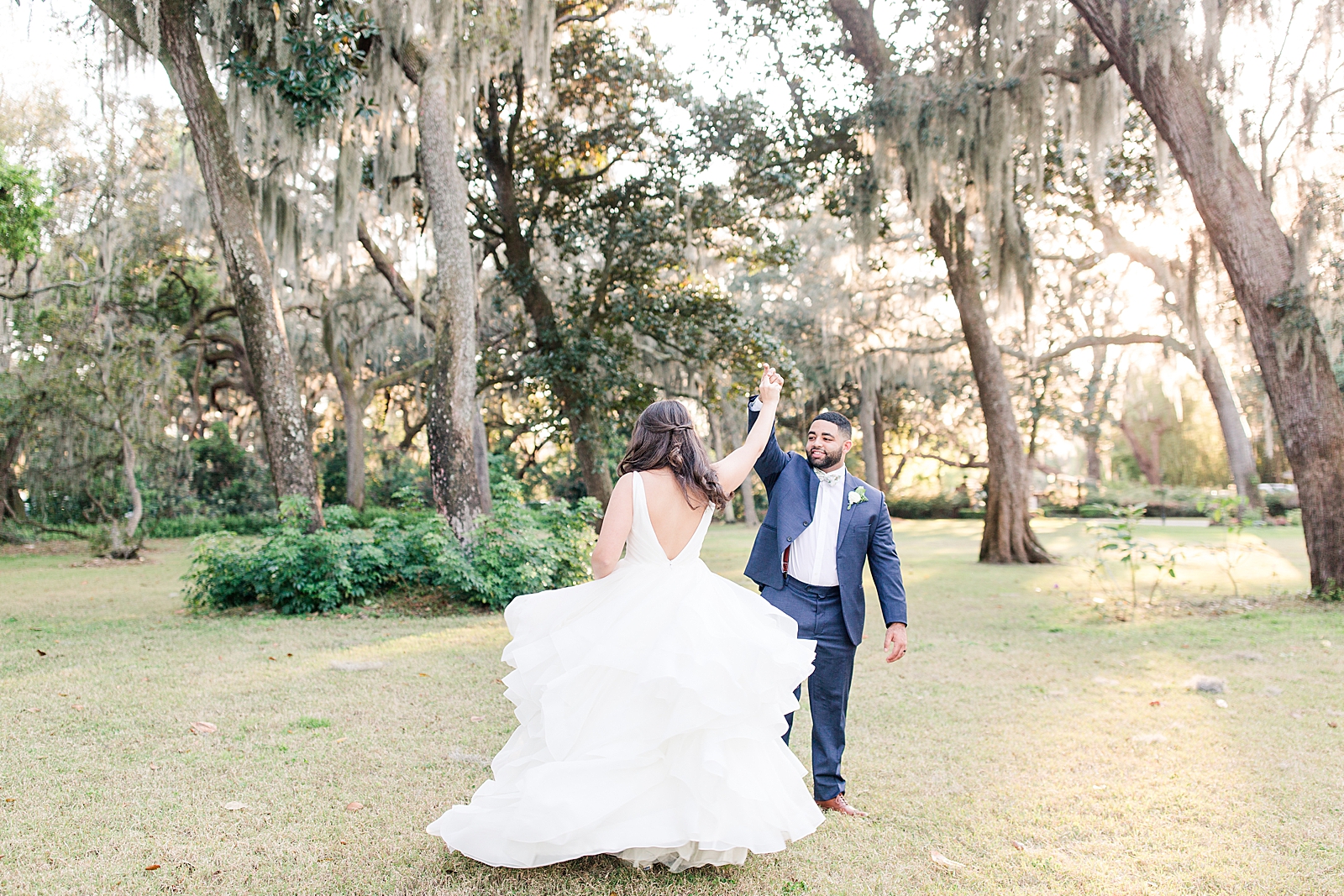 Enchanted Oaks Jacksonville Wedding Groom Twirling Bride Photo