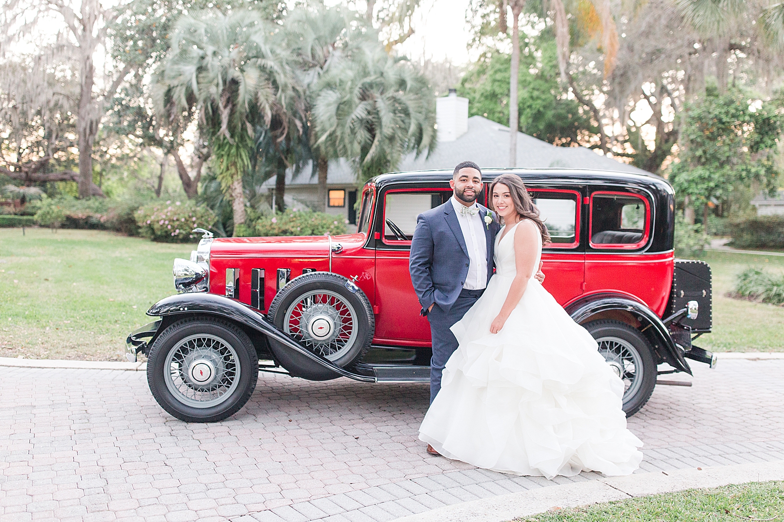 Enchanted Oaks Jacksonville Wedding Bride and Groom in Front of Vintage Chevrolet Photo