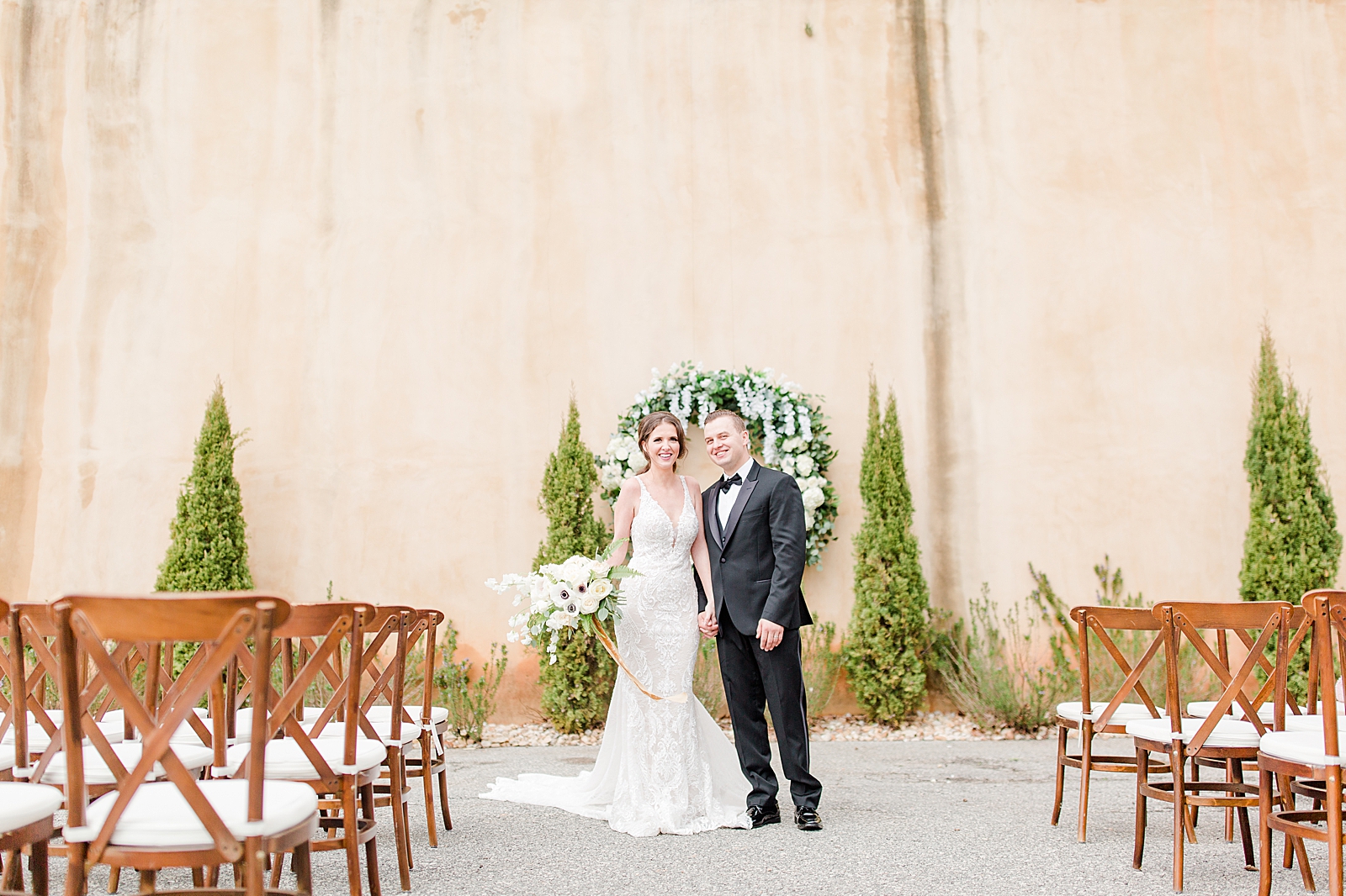 Montaluce Winery Wedding Ceremony Bride and Groom Laughing Walking Down Aisle Photo