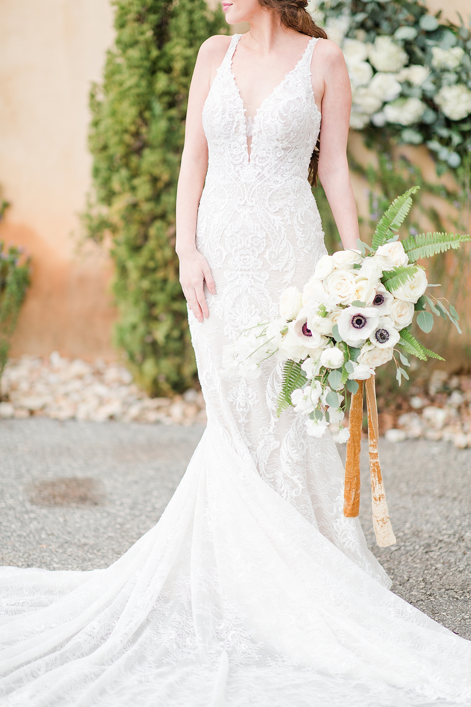 Montaluce Winery Wedding Bride holding bouquet by her side detail Photo